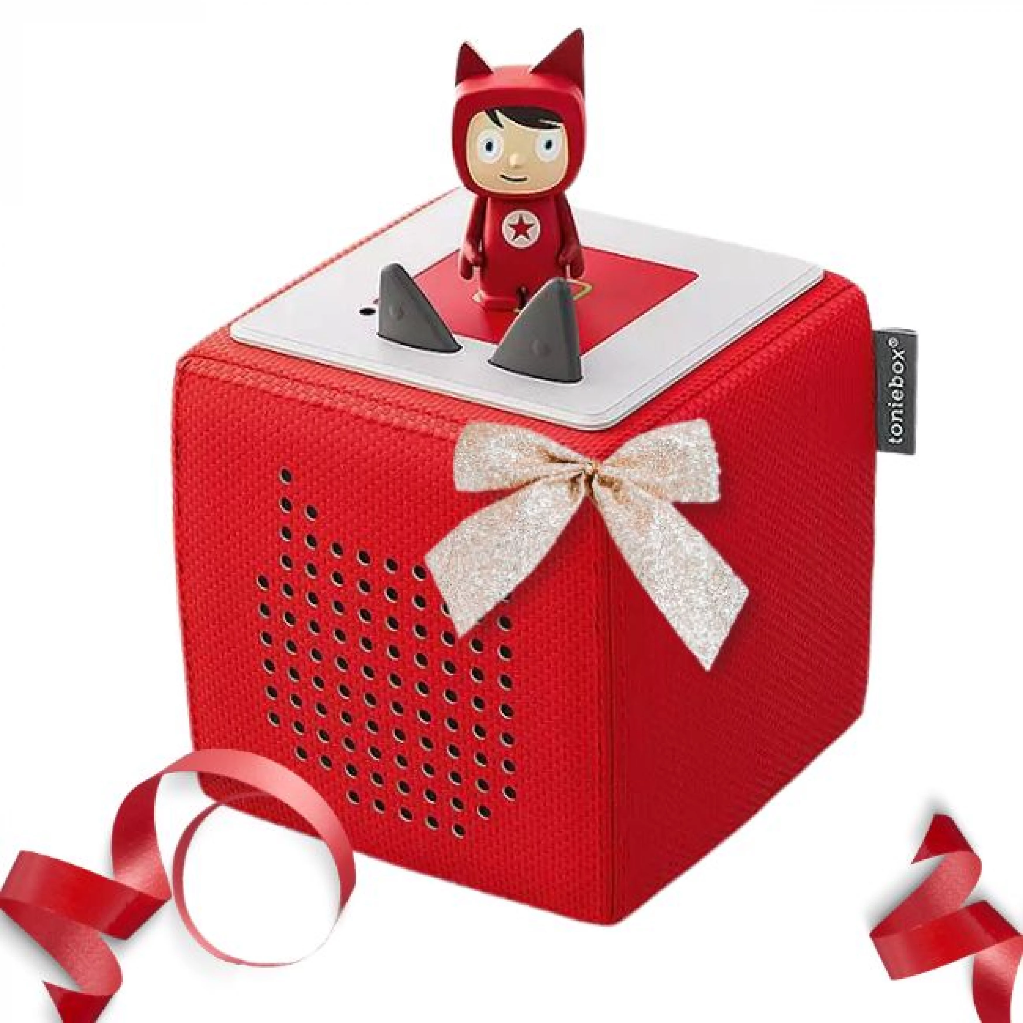 Rote Toniebox mit Tonie-Figur und Geschenkband​​​​​​​​​